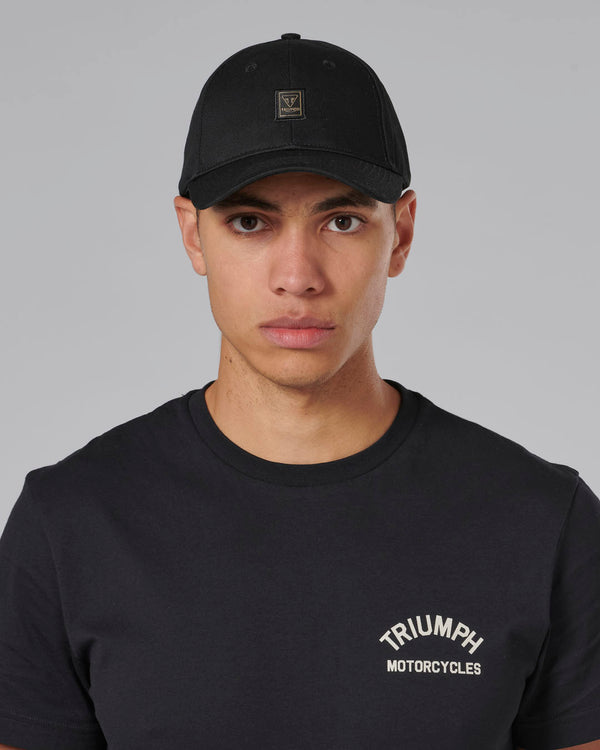 Charles Badge Baseball Cap in Black